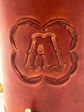 Handcrafted Leather Can Holder With Embossed "A" Design Durable Lacing And Handl